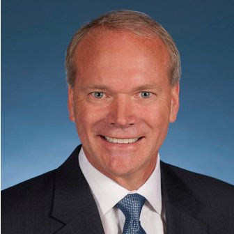 Professional headshot of Brett Wood, President & CEO of Toyota Material Handling North America (TMHNA)