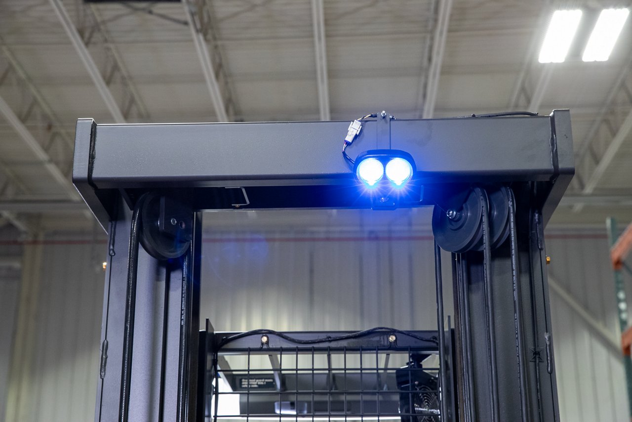Blue light attached to the top of a forklift truck's protective canopy